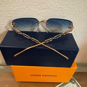 Louis Vuitton sunglasses. New with box.